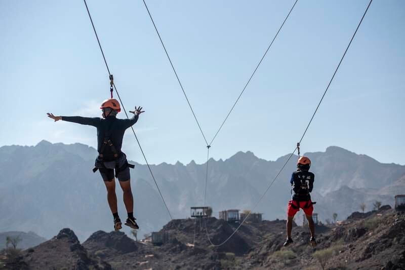 Adrenalin-fuelled pursuits at Hatta Wadi Hub include zip-lining, trampolining, paragliding and mountain biking. Photo: Dubai Holding