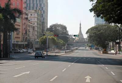 An almost-deserted street in Yangon, Myanmar's largest city. Activists had called on the public to take part in a silent strike on Friday. EPA