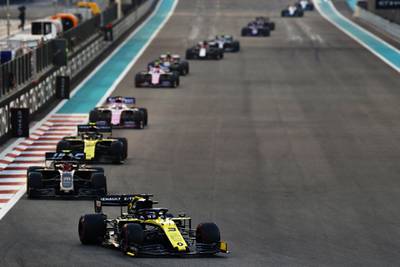 Daniel Ricciardo of Renault  leads Kevin Magnussen of Haas at Yas Marina Circuit. Getty