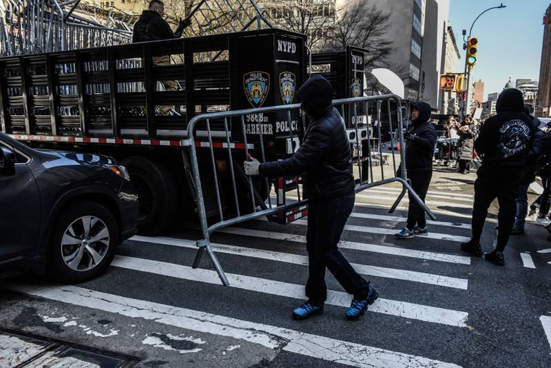 Barricades are set up outside the New York District Attorney's office on March 20. Bloomberg 