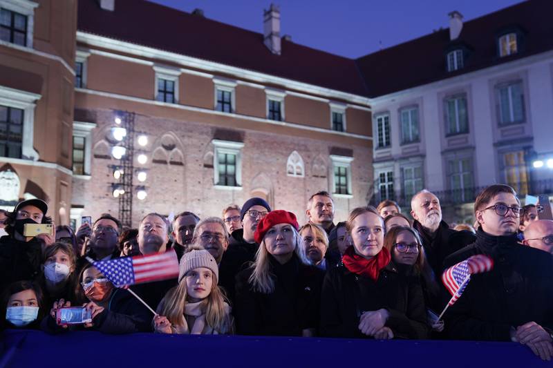 People listen as the US president delivers his speech about the Russian invasion of Ukraine.  AP