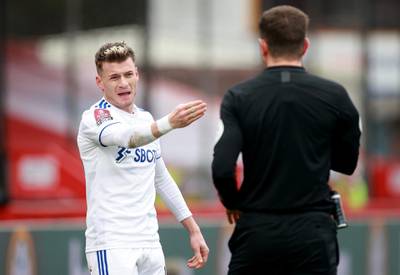 Leeds United's Ezgjan Alioski gestures at the referee. Reuters