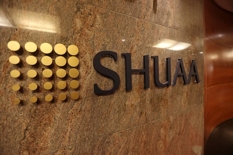 DUBAI , UNITED ARAB EMIRATES Ð Nov 13 , 2014 : Signage of the Shuaa Capital in Emirates Tower Offices in Dubai. ( Pawan Singh / The National ) For Business. Story by Sananda Sahoo