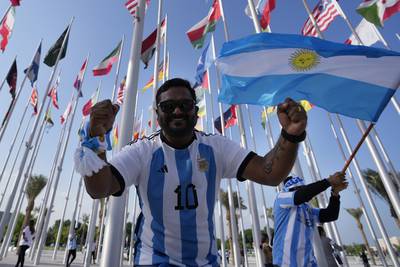 Fans from Argentina cheer at Flag Plaza in Doha. AP