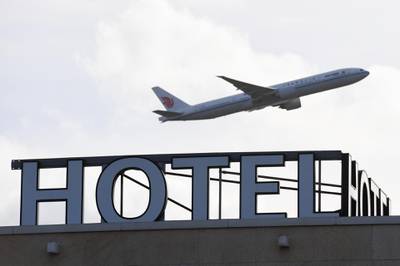 An aircraft flies over the Sofitel at London Heathrow airport on  February 15, 2021. Bloomberg