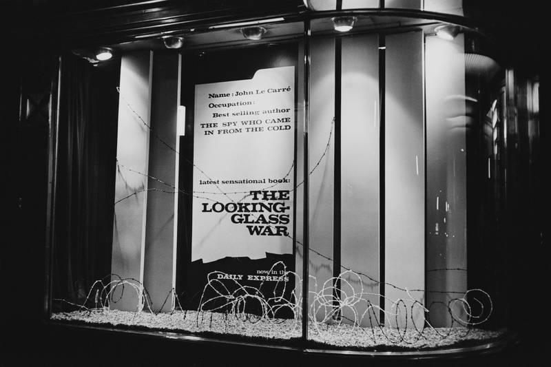 Vew of a window display featuring barbed wire promoting the upcoming serialisation of the John Le Carre spy novel 'The Looking Glass War' in the Daily Express newspaper at the Daily Express Building in Fleet Street, London on 21st June 1965. (Photo by Clive Limpkin/Daily Express/Hulton Archive/Getty Images)