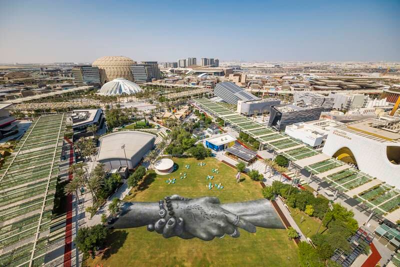 An aerial view shows a giant land art fresco by French-Swiss artist Saype, painted at Expo 2020 Dubai. Photo: Valentin Flauraud for Saype