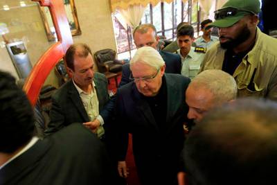 United Nations special envoy for Yemen Martin Griffiths (C) is pictured upon his arrival at Sanaa International airport on September 16, 2018. / AFP / MOHAMMED HUWAIS
