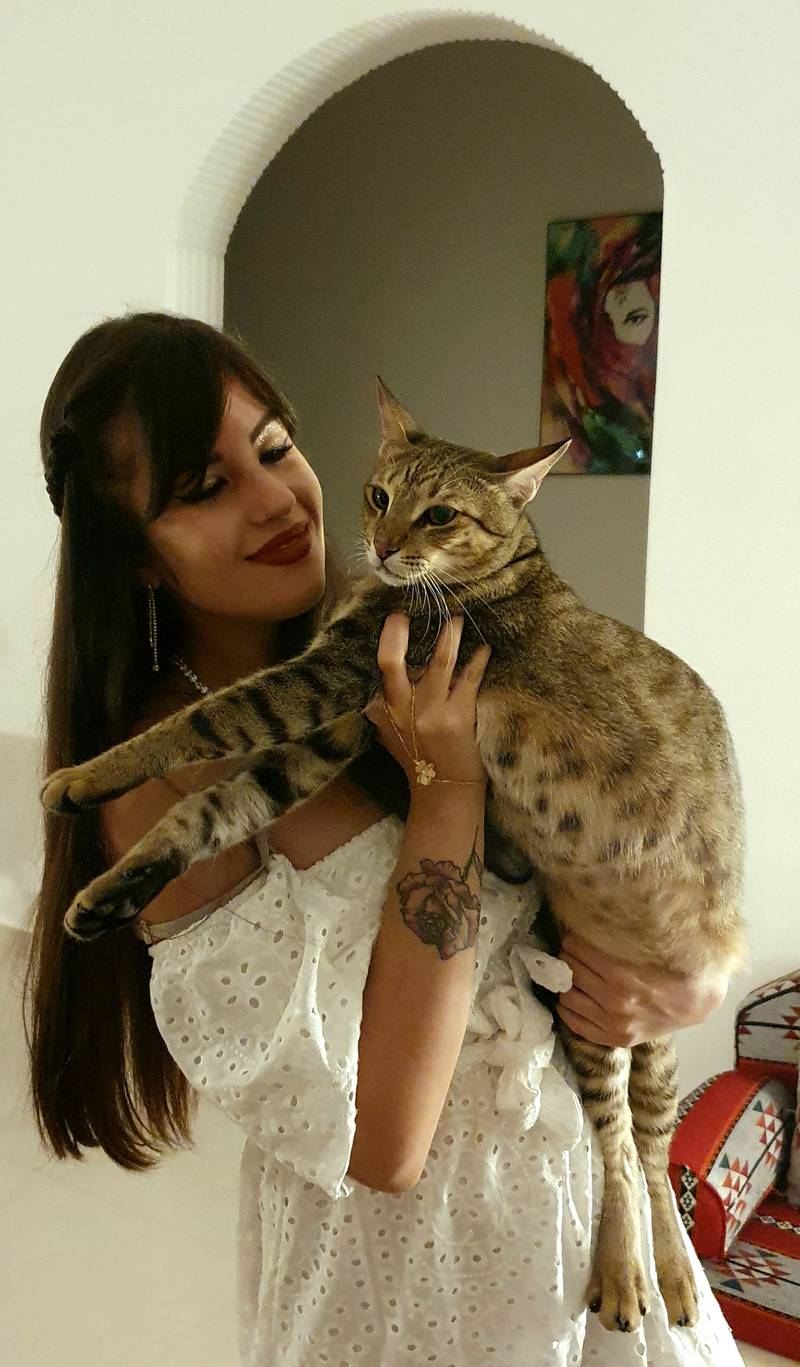 Sarah Provenzani with her cat Gordon, who resembles an Arabian wild cat. Photo: Sarah Provenzani