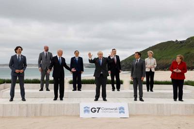 The G7 leaders pose for the 'family photo' at the start of the G7 summit in Carbis Bay, Cornwall. AFP