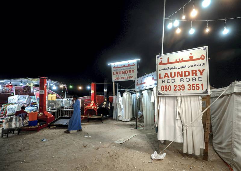 Abu Dhabi, United Arab Emirates, December 10, 2019.    -- Red Robe Laundry at the Al Dhafra Market.Victor Besa/The NationalSection:  NAReporter:  Anna Zacharias