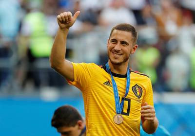 FILE PHOTO: Soccer Football - World Cup - Third Place Play Off - Belgium v England - Saint Petersburg Stadium, Saint Petersburg, Russia - July 14, 2018  Belgium's Eden Hazard celebrates with a medal after the match    REUTERS/Toru Hanai/File Photo