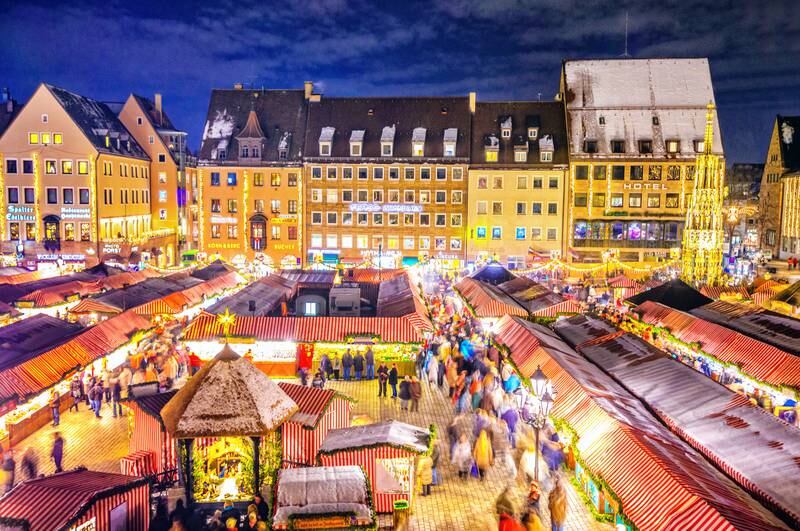 The world-famous Christkindlesmart Nurnberg is a sight to behold at night. Getty Images
