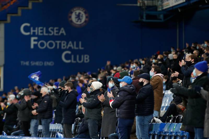 Spectators watch the English Premier League match between Chelsea and Leeds United at Stamford Bridge in London, England. AP