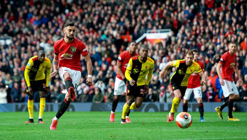 Manchester United's Bruno Fernandes scores against Watford at Old Trafford. EPA