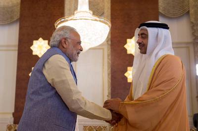 ABU DHABI, UNITED ARAB EMIRATES - August 16, 2015: HH Sheikh Abdullah bin Zayed Al Nahyan, UAE Minister of Foreign Affairs (R), greets HE Narendra Modi, Prime Minister of India (L), at the Presidential Airport. 

( Rashed Al Mansoori / Crown Prince Court - Abu Dhabi )
--- *** Local Caption ***  20150816RMC01_0450.JPG