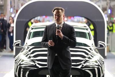 Tesla chief executive Elon Musk speaks during the opening day of the Tesla Gigafactory in Gruenheide, Germany.   EPA