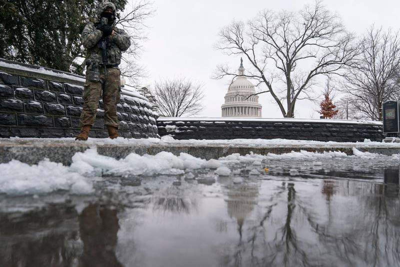 A National Guard soldier stands his post in front of the US Capitol, on Monday, February 1, 2021, in Washington. AP