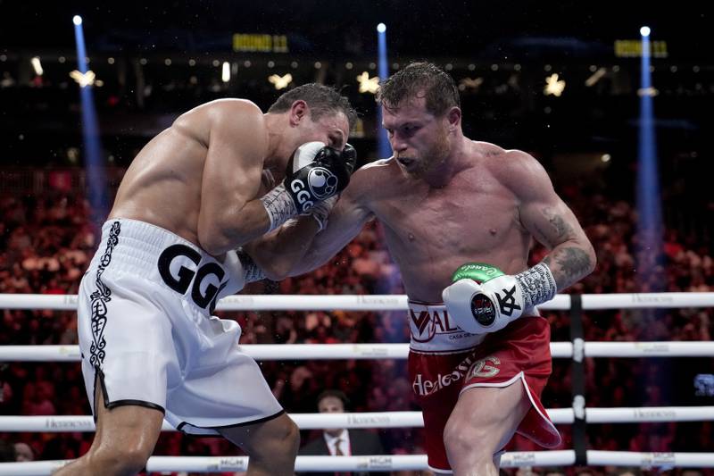 Saul 'Canelo' Alvarez lands a body shot on Gennady Golovkin during their undisputed super middleweight title fight on Saturday, September  17, 2022 in Las Vegas. AP