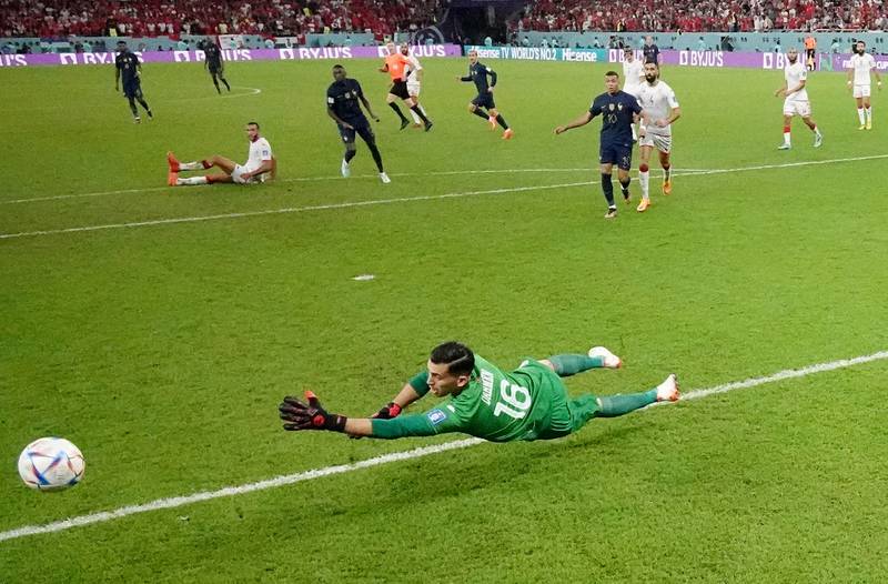 Tunisia goalkeeper Aymen Dahmen makes a save. Getty 