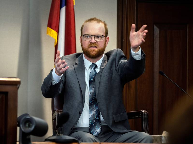 Travis McMichael speaks from the witness stand during the trial over the killing of Ahmaud Arbery in Brunswick, Georgia. Reuters