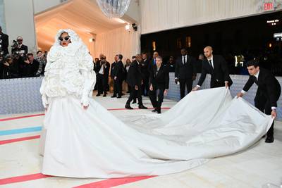 Rihanna arrives in custom Valentino. AFP