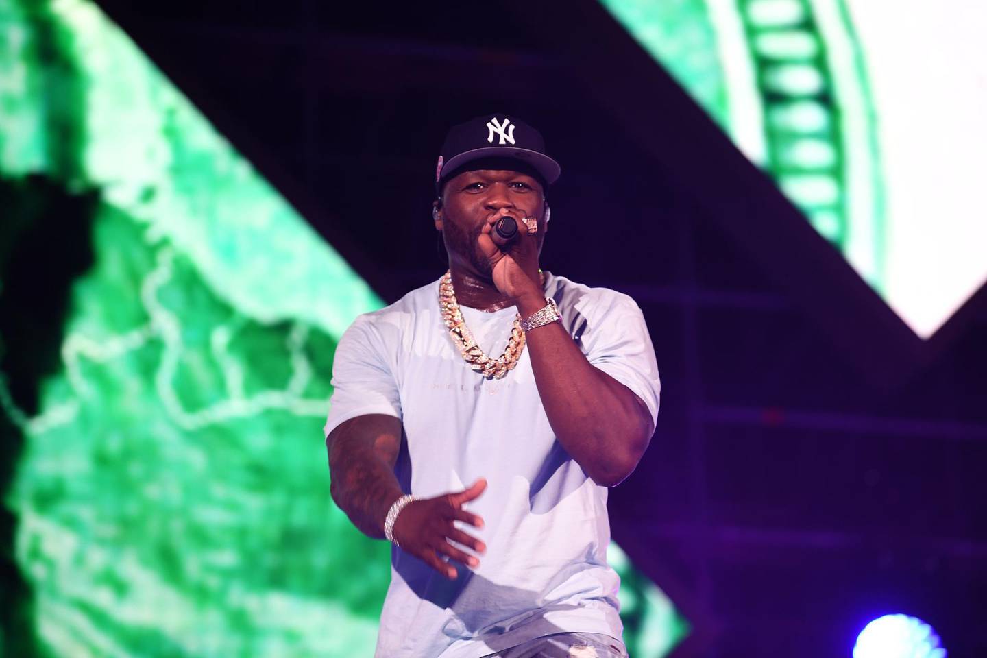 US rapper 50 Cent performs on stage during the Jeddah World music Festival on July 18, 2019, at the King Abdullah Sports City in the coastal city of Jeddah. US Pop icon Janet Jackson and US rapper 50 Cent are among musicians set to perform in Saudi Arabia, organisers said, after US rapper Nicki Minaj pulled out in a show of support for women's rights. / AFP / AMER HILABI
