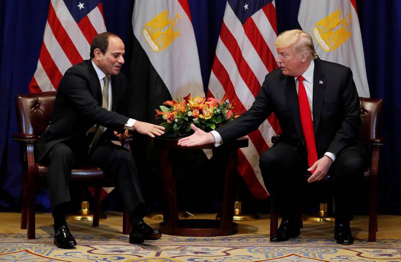 Egypt's President El Sisi reaches to shake hands with US President Donald Trump. Reuters