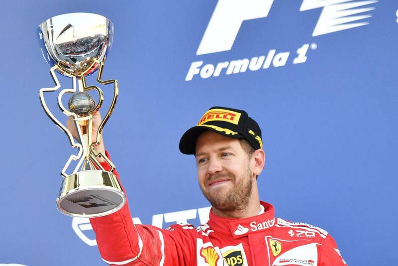 Sebastian Vettel celebrates his second place after the Formula One Russian Grand Prix at the Sochi Autodrom circuit in Sochi on April 30, 2017. Andrej Isakovic / AFP