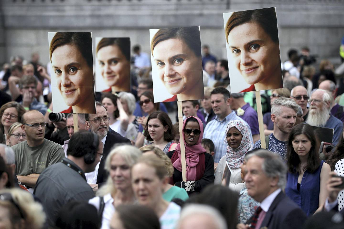 LLONDON, UNITED KINGDOM - JUNE 22:  Members of the public attend a memorial event for murdered Labour MP Jo Cox at Trafalger Square on June 22, 2016 in London, United Kingdom. On what would have been her 42nd birthday, Labour MP Jo Cox is remembered worldwide in a series of #moreincommon events today. The Labour MP for Batley and Spen was shot and stabbed in the street on June 16 and later died. A fund set up in her name has raised over Ã‚Â£1.23 M GBP to date  (Photo by Dan Kitwood/Getty Images)