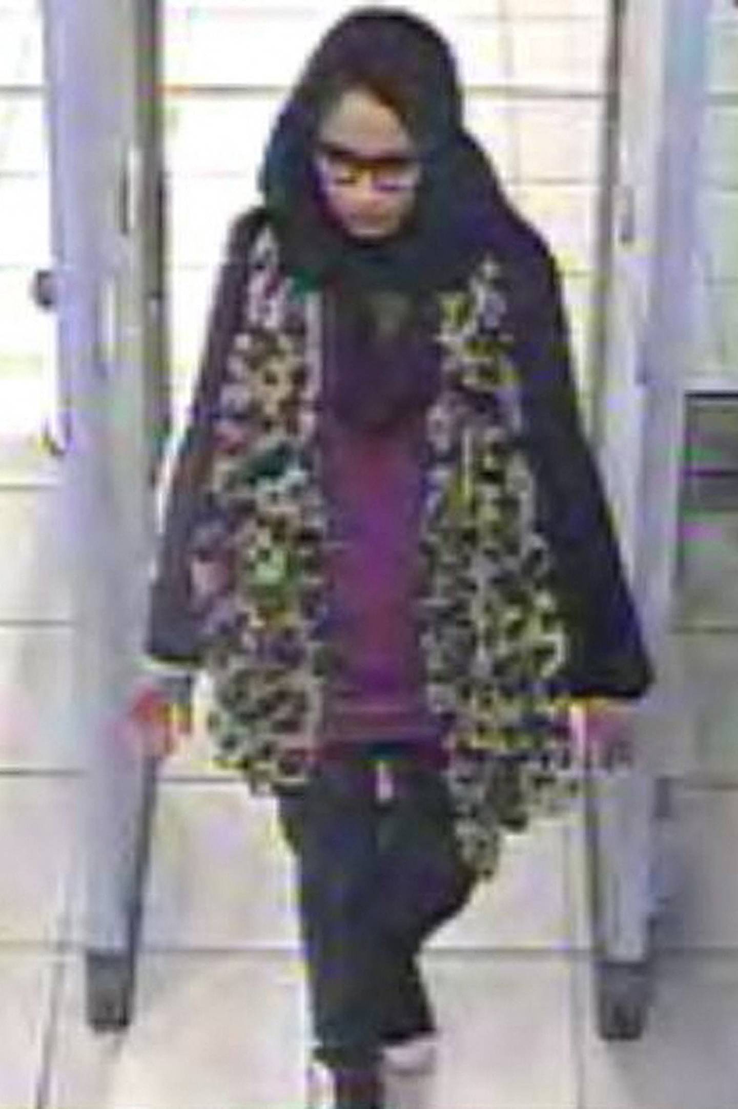 Shamima Begum passing through security barriers at Gatwick Airport, south of London, on February 17, 2015. AFP 