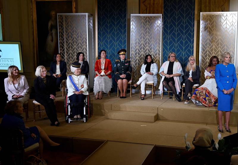 Ms Biden with the recipients of the International Women of Courage Award. AFP