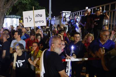 Supporters of the Israeli "change" coalition gather in Tel Aviv. The coalition is led by opposition leader Yair Lapid. AFP