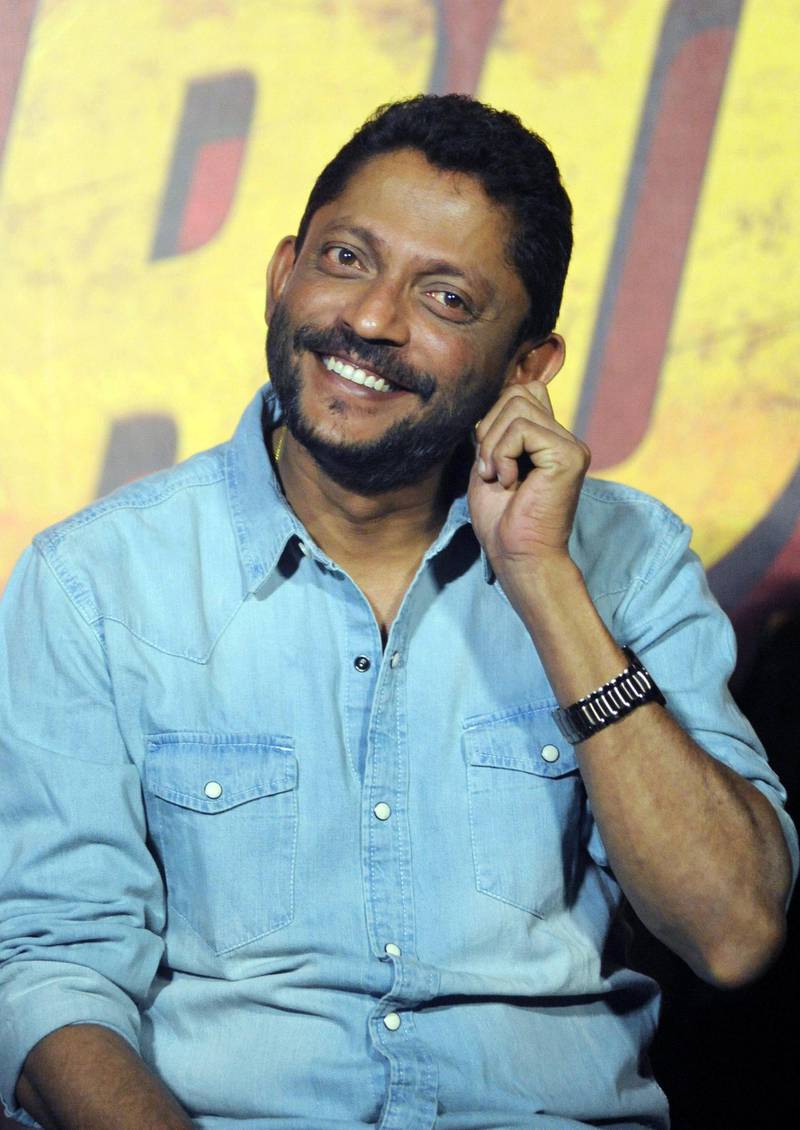 Indian Bollywood director Nishikant Kamat speaks during a promotional event for his forthcoming Hindi film 'Rocky Handsome' in Mumbai on March 4, 2016. AFP PHOTO / STR (Photo by STRDEL / AFP)