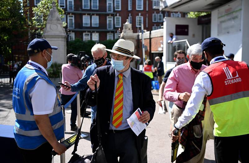 Supporters arrive at Lord's for the opening day of the first Test. Getty