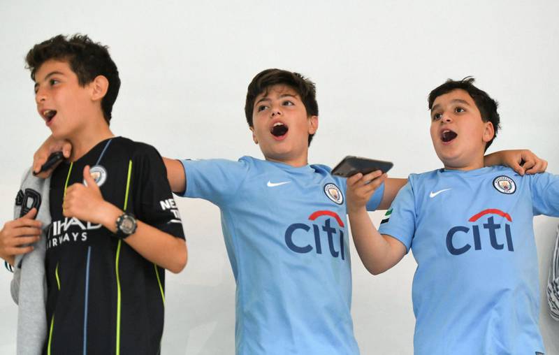 Abu Dhabi, United Arab Emirates - Manchester City fans rejoice as the team wins the Premier League against Brighton Albion 4-1, special screening at Mubadala Arena, Zayed Sports City. Khushnum Bhandari for The National