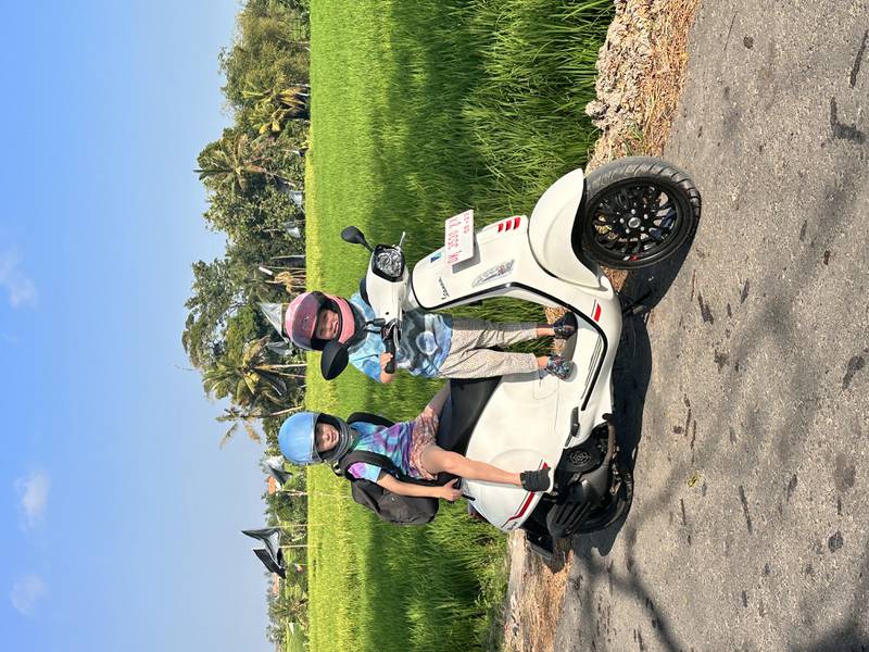 Rees and her children ride scooters to school. Photo: Chloe Rees