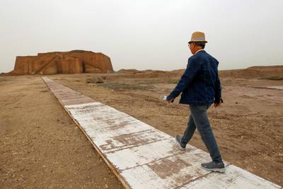 A man walks towards the ancient archaeological site of Ur, near Nassiriya, Iraq, before the planned arrival of Pope Francis. Reuters