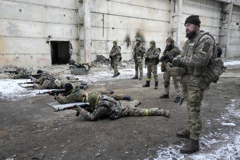Belarusian volunteers receive military training at the Belarusian Company base in Kyiv, Ukraine. Hundreds of Belarusians have arrived in Ukraine to help the Ukrainian army fight against the Russians. AP