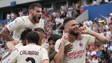 An image that illustrates this article Milan seal first Serie A title in 11 years after win at Sassuolo