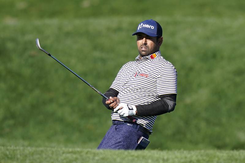 Anirban Lahiri was five-under for his third round through 11 holes and will resume with a one-shot lead at the Players Championship. AP