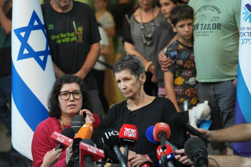 Yocheved Lifshitz speaks to television crews outside Ichilov Hospital in Tel Aviv. AFP