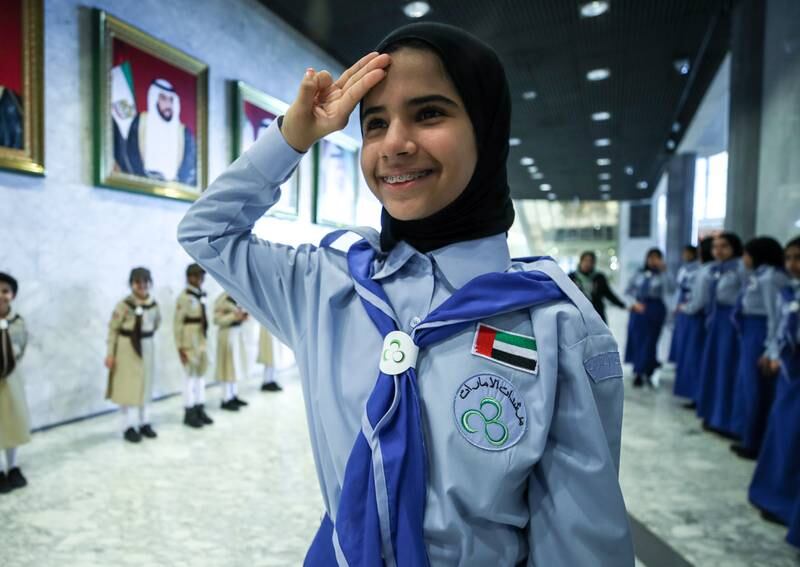 Meera Almentheri, 12, welcomes guests to the 23rd Arab Regional Conference for Girl Guides. All photos: Victor Besa / The National