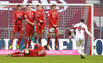 Stuttgart's Gonzalo Castro fails to find his way past a Bayern wall from a free-kick. Reuters