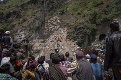 Aamir Ali, an official at the government’s disaster management department, said three workers trapped at the entrance of the tunnel were rescued. 