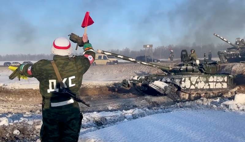 Russian tanks return from a shooting range in the Voronezh region. Russia said some of its forces near the Ukraine border would be returning to their bases after completing exercises. EPA