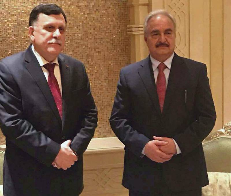 Libyan Government of National Accord leader Fayez Al Sarraj and Field Marshal Khalifa Haftar met in Abu Dhabi in May 2017 as part of the UAE's efforts to find a political solution to the Libyan conflict. AP 