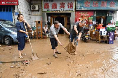After the rain, clean-up efforts begin in Gongyi city.