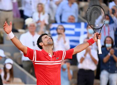 Novak Djokovic celebrates after defeating Stefanos Tsitsipas in the French Open final. EPA
