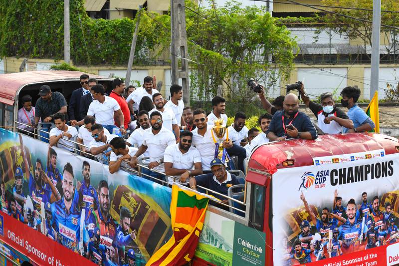 Sri Lankan players received a hero's welcome after landing in Colombo. AFP